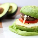 Avocado "Bun" Breakfast Sandwich With Sausage, Egg, Tomato and White Cheddar