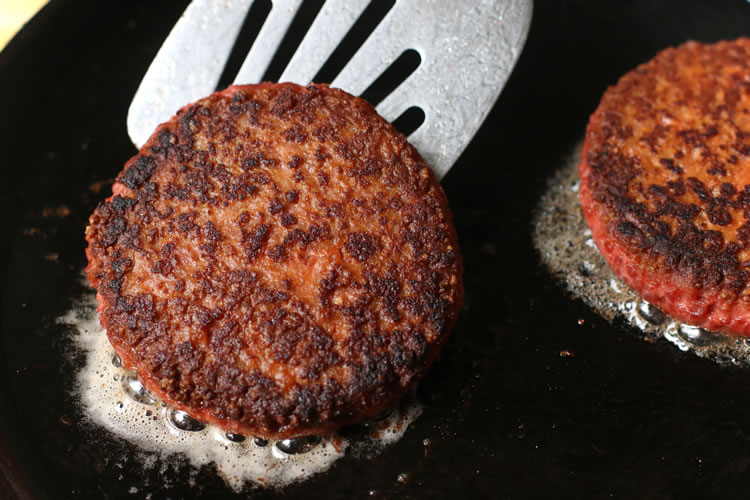 Beyond Meat Burgers Sizzling In The Skillet