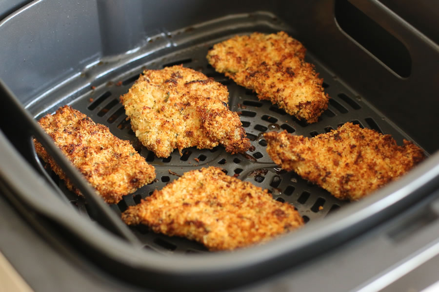 Air fried crispy chicken breasts made with the Ninja Foodi Grill