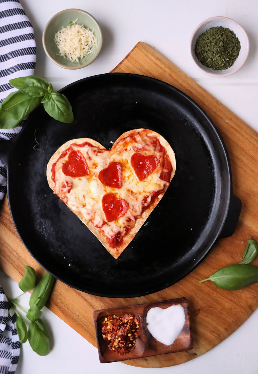 Low-Carb Valentines Day Tortilla Pizza on skillet with basil