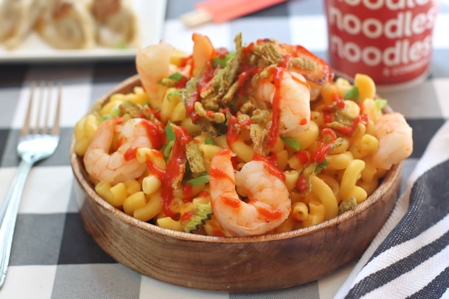 Customized mac and cheese from Noodles & Company with sauteed shrimp, crispy jalapenos and sriracha