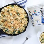 Spinach & Artichoke Greek Yogurt Mac Cheese in a skillet