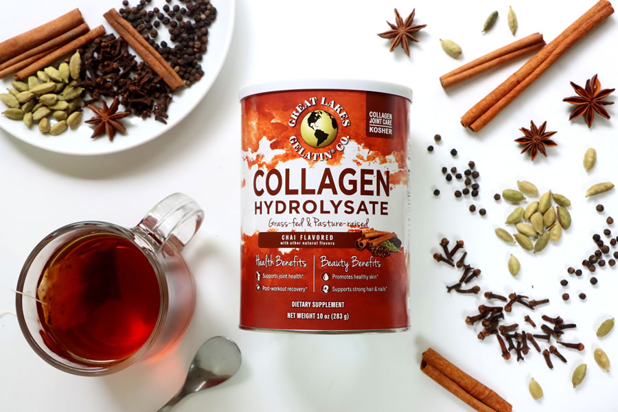 Great Lakes Chai Collagen next to chai spices and a cup of tea 