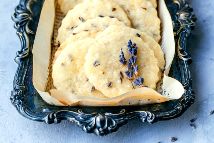 lavender shortbread cookies on a scrolled antique plate with lavender sprigs
