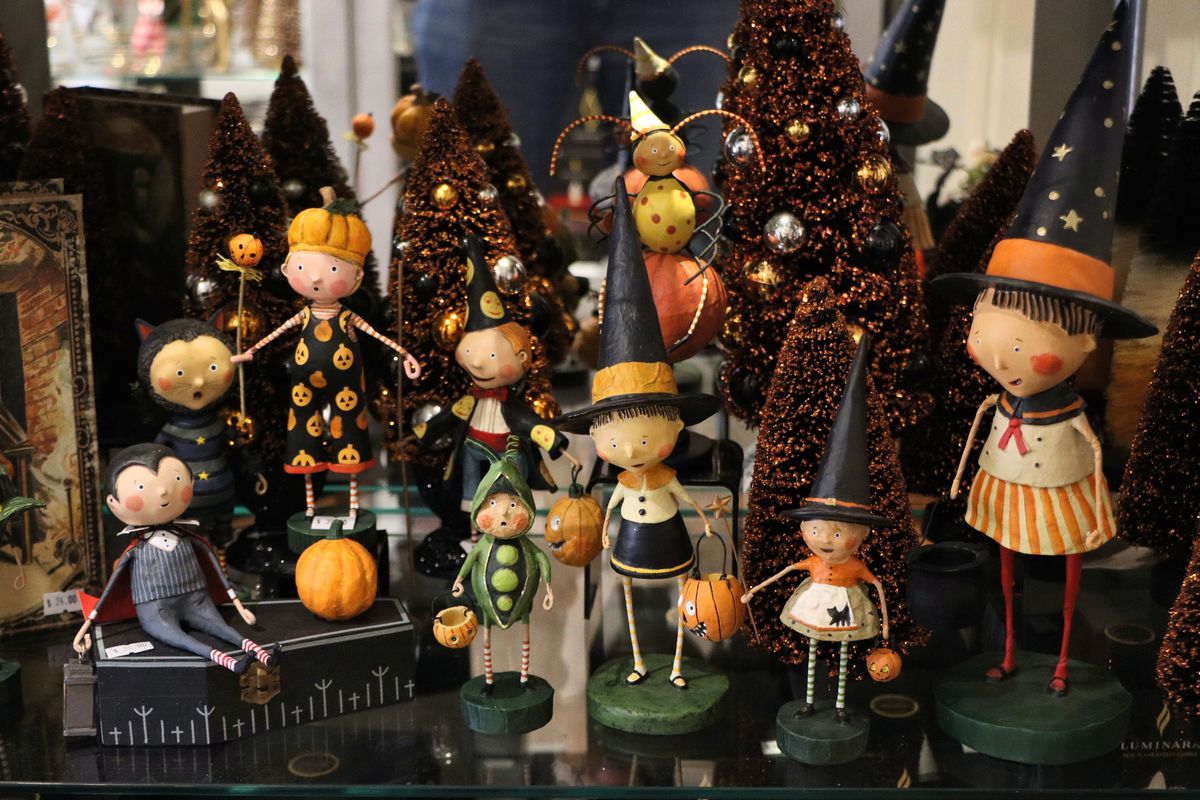 A Halloween display of figures at The Wooden Duck at Peddler's Village