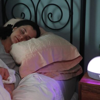 A woman sleeping soundly in bed