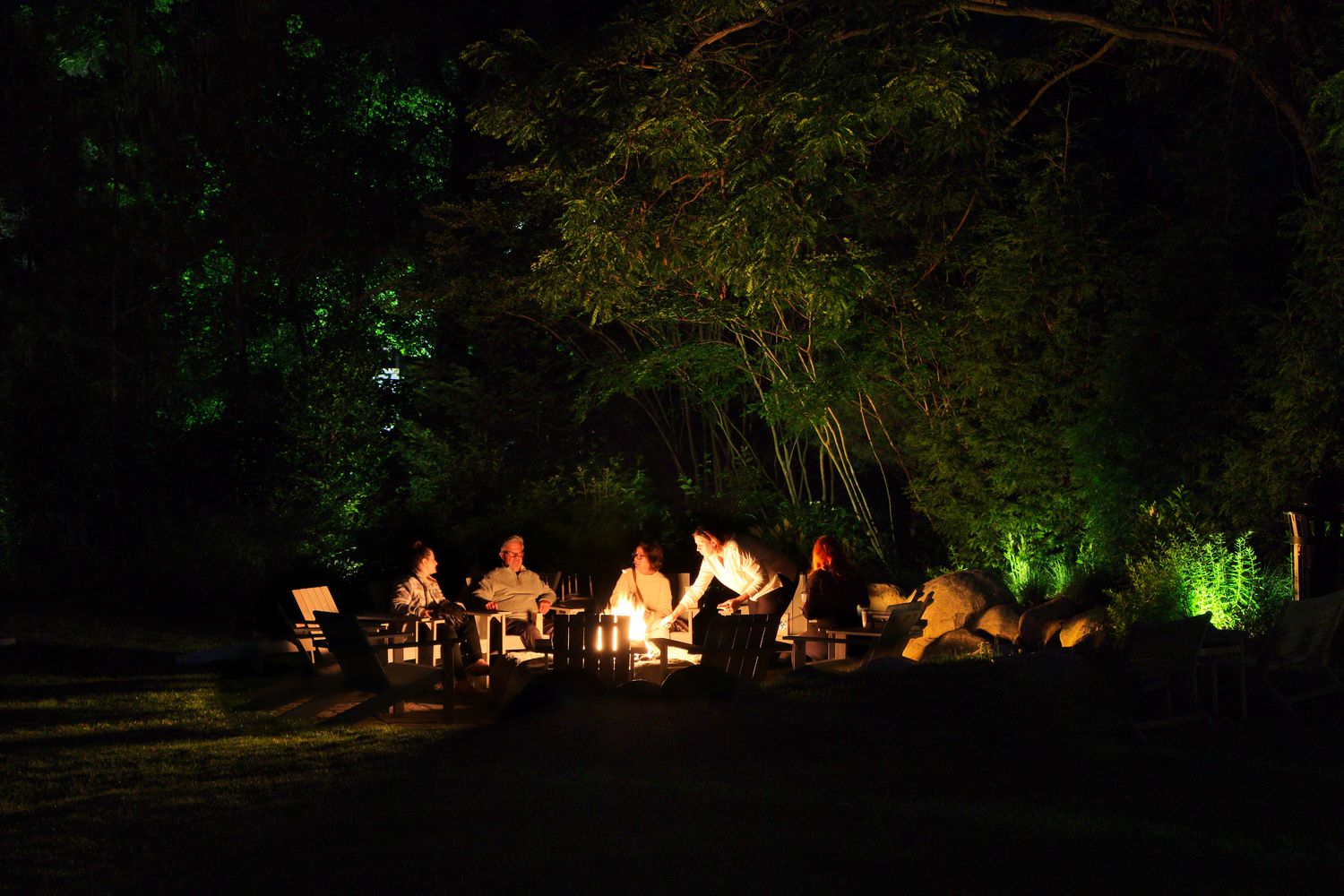 Guests of the Wildset Hotel around the firepit in St. Michaels, MD.