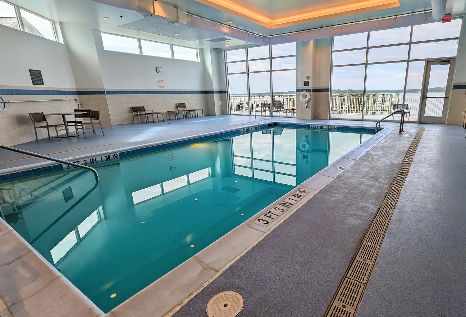 The large indoor pool looking out to the water at Hyatt Place Kent Narrows