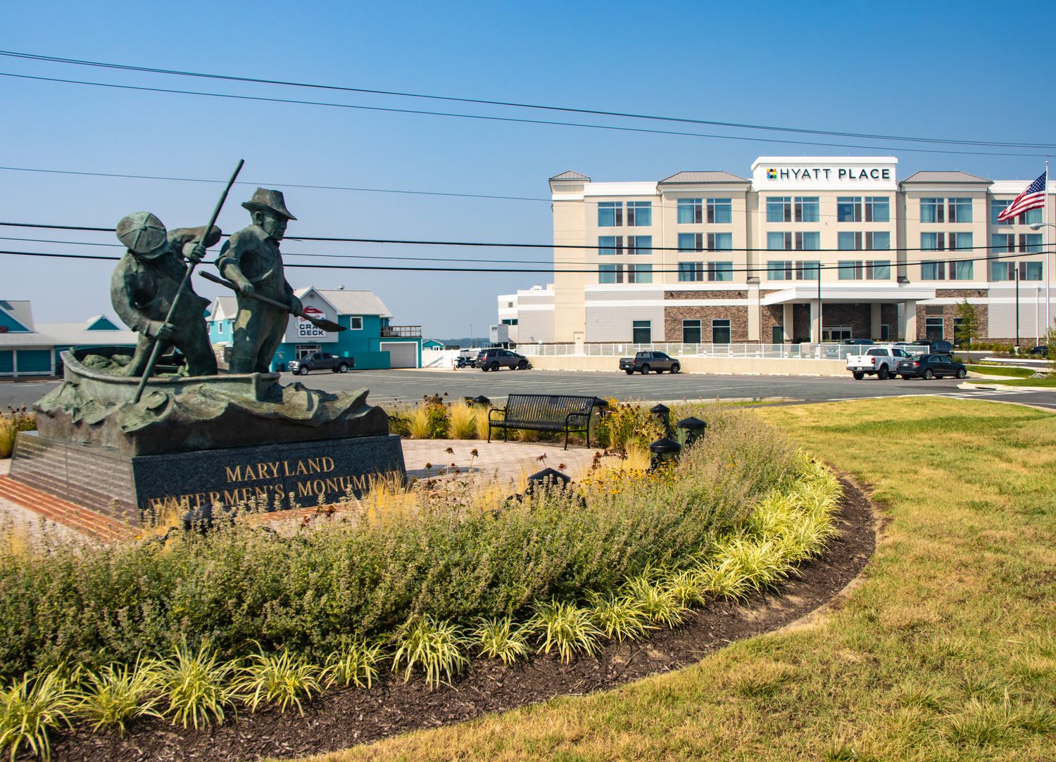 The Maryland Waterman's Monument and the Hyatt Place at the entrance of Kent Narrows, MD