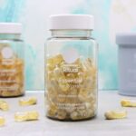 Ritual vitamin bottles with capsules, showing vegan D3, omega-3 DHA, and USP verified certification