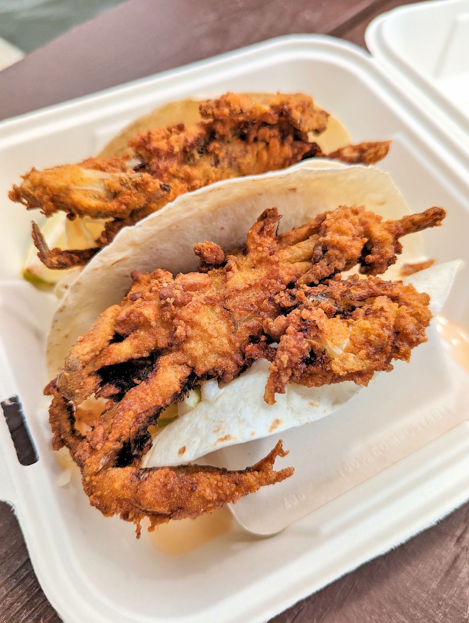 2 Soft Shell Crab Tacos in a container at Big Owl Tiki Bar in Kent Narrows, MD