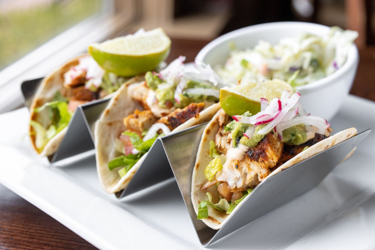 3 baja fish tacos with coleslaw and lime at Buttonwood Grill