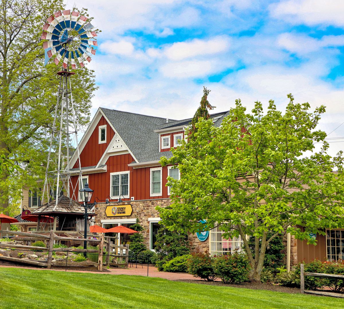 The windmill and shops of Peddler's Village in springtime
