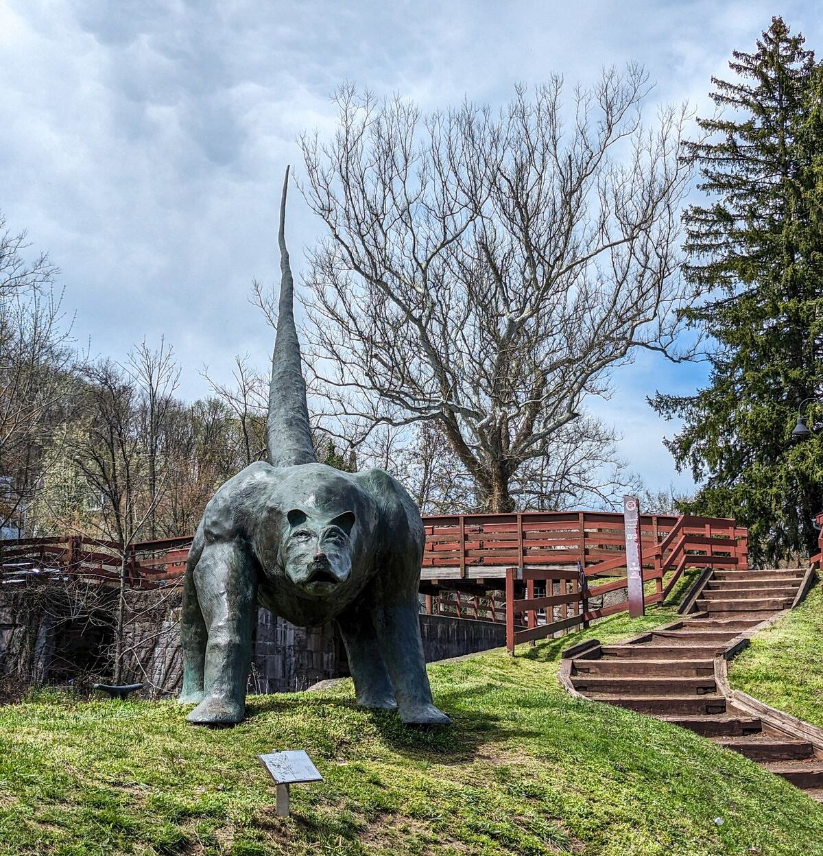 "Boomer" a large dog/dinosaur sculpture greets visitors on their way to New Hope