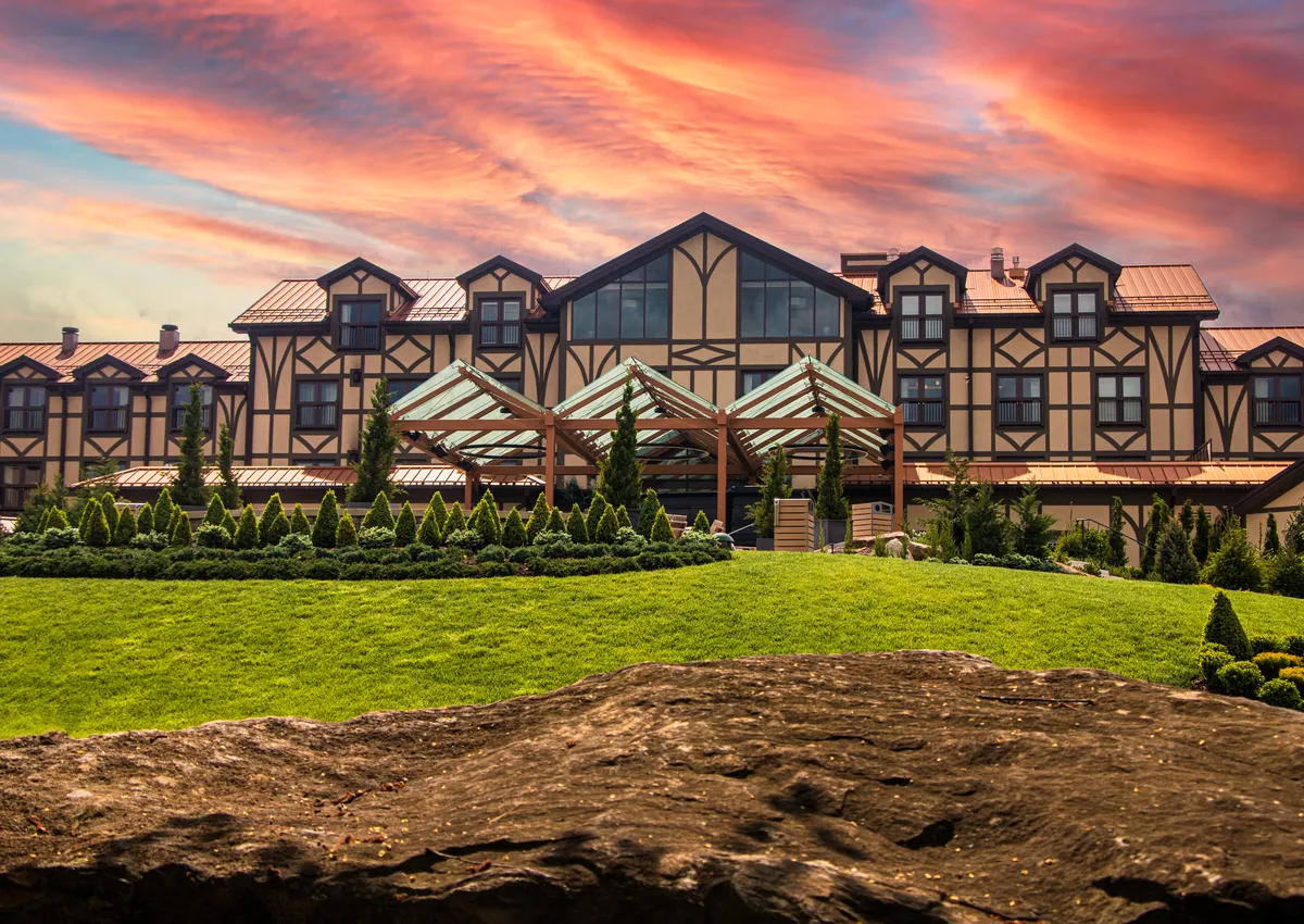 Sunset over The Grand Lodge at Nemacolin. A brilliant sky over the front exterior of the building. 