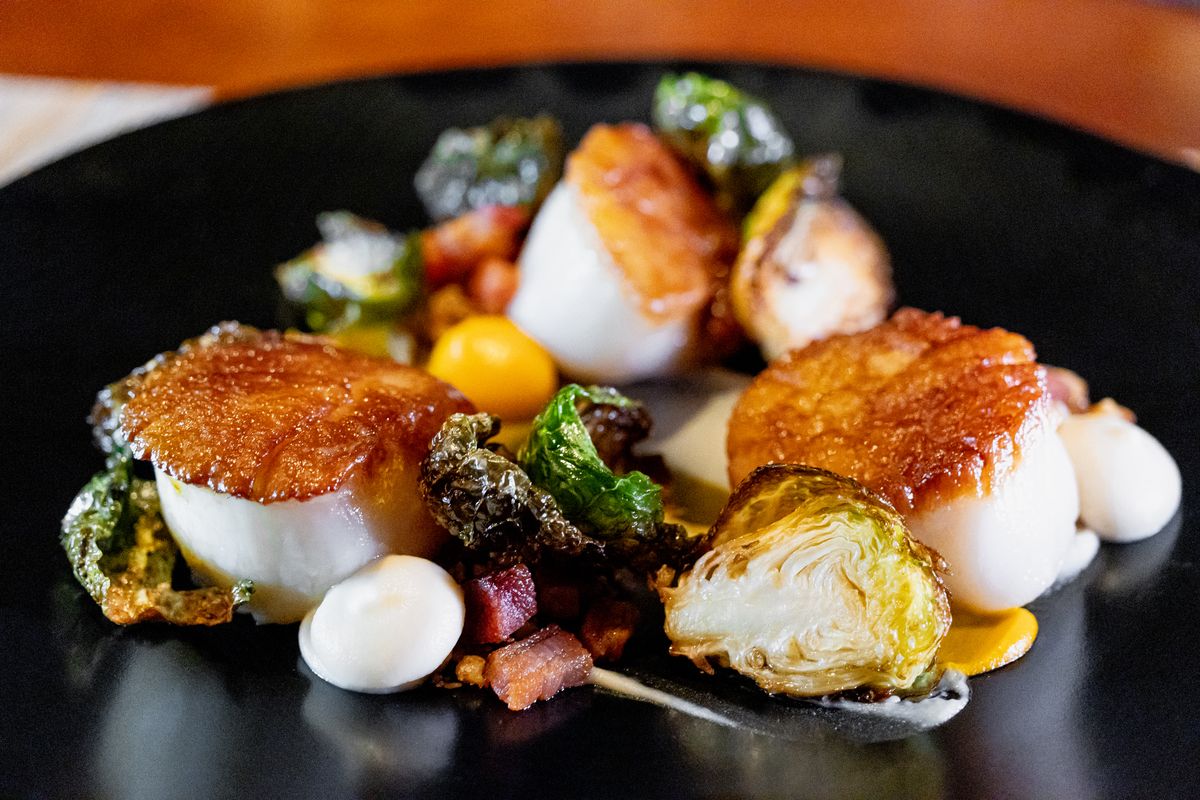 Pan-Seared Scallops at Aqueous. Scallops with brussels sprouts.