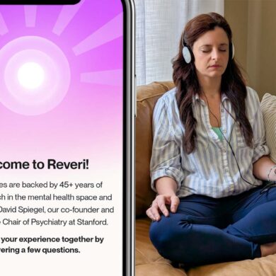 Split image showing a smartphone on the left displaying Reveri's welcome screen with a purple radial sunburst pattern and white center circle. The screen reads "Welcome to Reveri!" followed by text explaining "Our exercises are backed by 45+ years of clinical research in the mental health space and created by Dr. David Spiegel, our co-founder and the Associate Chair of Psychiatry at Stanford." Below states "Let's shape your experience together by answering a few questions." On the right side, a woman sits cross-legged on a tan leather couch wearing a light blue striped shirt and dark jeans. She has brown hair, closed eyes in a meditative state, and wears white headphones connected to a smartphone displaying a pink/orange gradient interface. Her hands rest naturally on her legs, and the setting shows a peaceful living room with natural lighting through sheer curtains and a textured throw pillow visible on the couch.