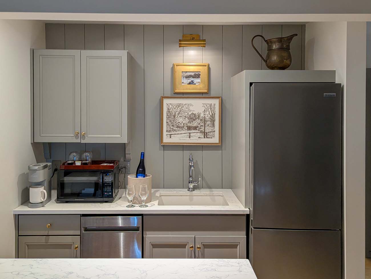 Spacious lower level of Golden Plough Inn bi-level suite kitchenette at Peddler's Village.