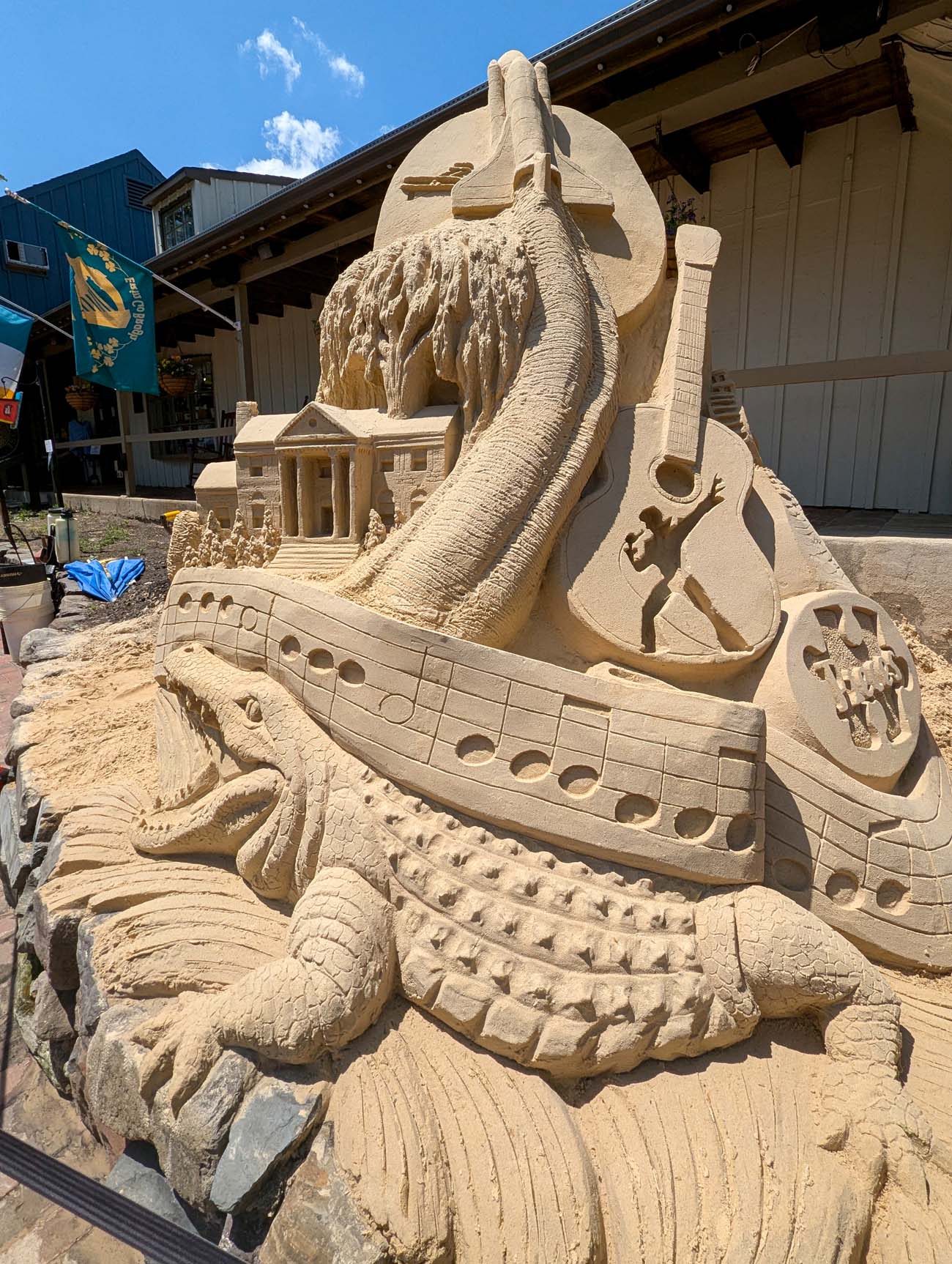 Sights in Sand: An American Road Trip Southeast sculpture with a gator, Graceland, and space shuttle