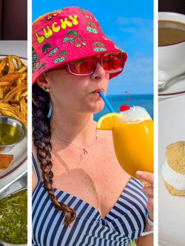 A vibrant collage of three summer scenes: On the left, a plate with a broiled lobster tail, golden hand-cut fries, a wedge of lemon, and drawn butter is served on a classic red-trimmed plate, accompanied by fresh salad and chimichurri sauce on a white-clothed table. In the center, a person in a striped swimsuit and a bright red bucket hat embroidered with "Lucky" holds a frosty orange cocktail garnished with a cherry against a backdrop of bright blue sky and ocean. On the right, a hand pours rich chocolate sauce from a white pitcher onto a trio of ice cream-filled profiteroles stacked on a plate with a cup of hot coffee in the background.