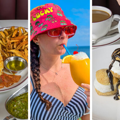 A vibrant collage of three summer scenes: On the left, a plate with a broiled lobster tail, golden hand-cut fries, a wedge of lemon, and drawn butter is served on a classic red-trimmed plate, accompanied by fresh salad and chimichurri sauce on a white-clothed table. In the center, a person in a striped swimsuit and a bright red bucket hat embroidered with "Lucky" holds a frosty orange cocktail garnished with a cherry against a backdrop of bright blue sky and ocean. On the right, a hand pours rich chocolate sauce from a white pitcher onto a trio of ice cream-filled profiteroles stacked on a plate with a cup of hot coffee in the background.