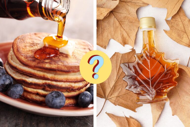 maple syrup poured on pancakes next to a leaf shaped jar of maple syrup