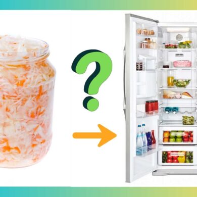 a jar of sauerkraut next to a open refrigerator
