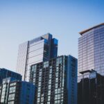 a skyline of high rise buildings at dusk