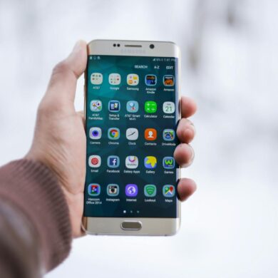 Person Holding Silver Android Smartphone