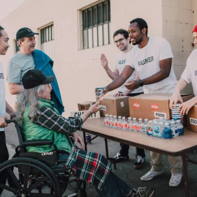 a group of people volunteering to help the less fortunate