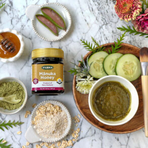 a flat lay of a jar of manuka honey surrounded around all the different types of things and ingredients that you can do with it