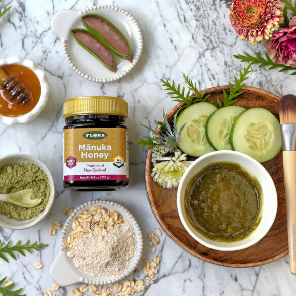 a flat lay of a jar of manuka honey surrounded around all the different types of things and ingredients that you can do with it