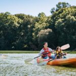 a family rafting in Central Delaware