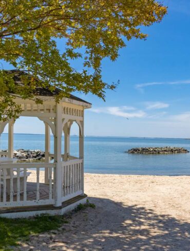 Ferry Park Beach Rock Hall Maryland white gazebo and Chesapeake Bay | Photo: Better Living
