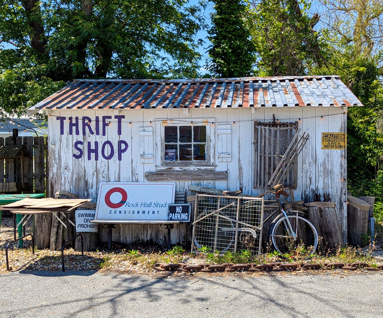 Rock Hall Harbor Shack thrift shop weathered building purple sign