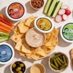 a selection of bitchin sauces and foods to dip in