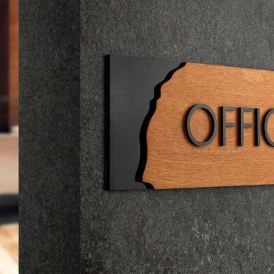 Wooden office sign with clean lettering and a black accent edge, designed for corridor wayfinding