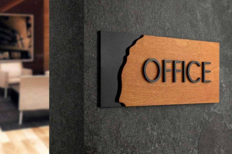 Wooden office sign with clean lettering and a black accent edge, designed for corridor wayfinding