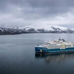 A luxury cruise ship crossing the International Date Line in Antarctica
