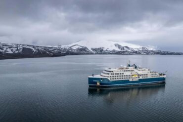 A luxury cruise ship crossing the International Date Line in Antarctica