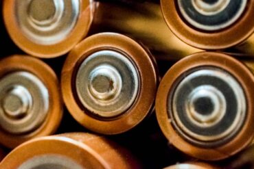 a closeup shot of the tops of aa and aaa batteries