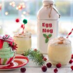 Charming Christmas display with eggnog and festive cupcake on a table