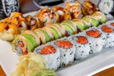 a delicious batch of takeout sushi rolls