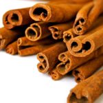 close up on a bundle of stacked cinnamon sticks